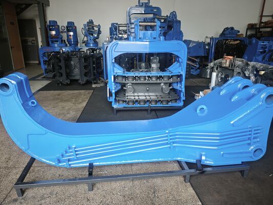 Hydraulic Pile Driver with Integrated Control Valve Assembly and Dual Pump Flow Merging System